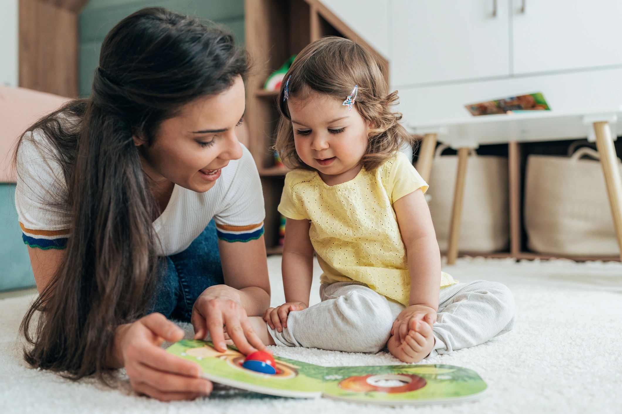 Parent and child reading together to support language development